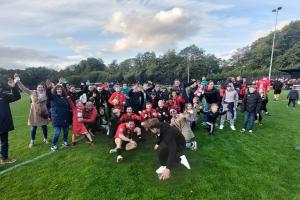 Bracknell Town FC celebrate reaching the First Round Proper of Emirates FA Cup